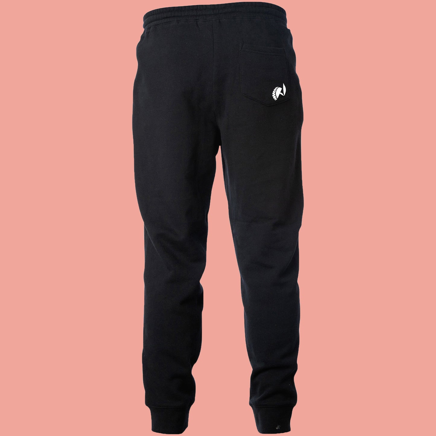 Killer Greens sweatpants. White logo flower on back pocket. Black unisex, ethically-made mid-weight fleece pants. Rear view. by BBJ / Glitter Garage