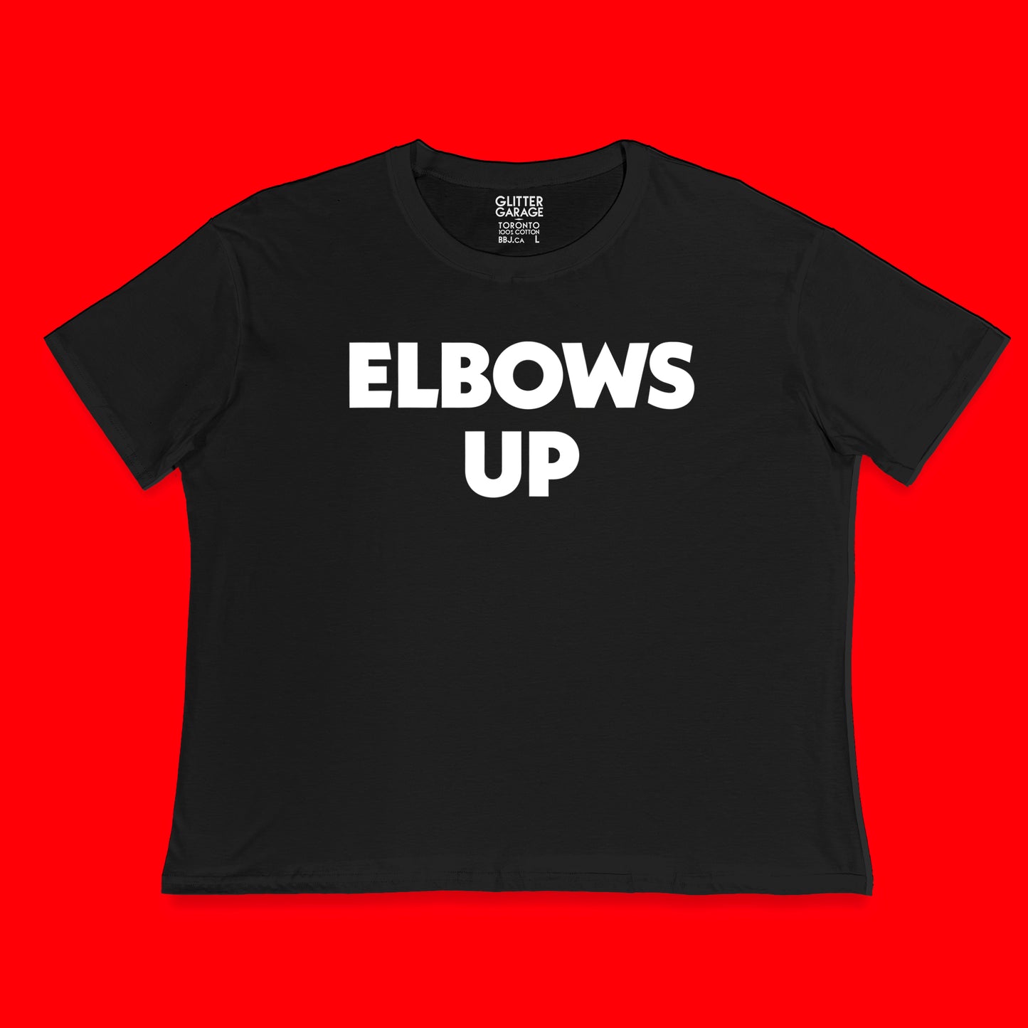 "Elbows Up" large text in white on black Canadian-made boxy tee