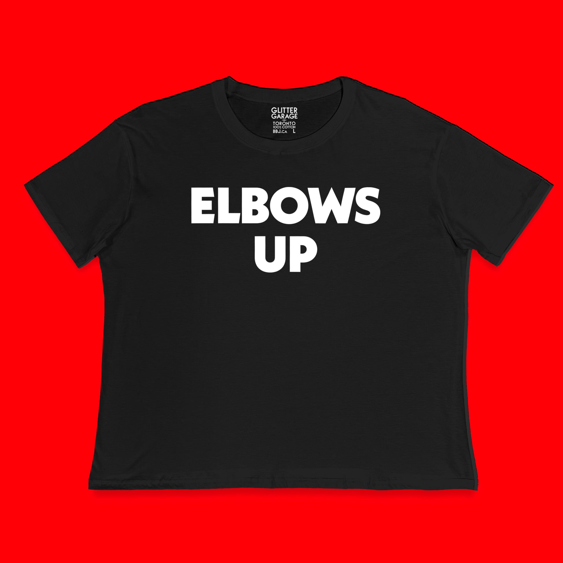 "Elbows Up" large text in white on black Canadian-made boxy tee