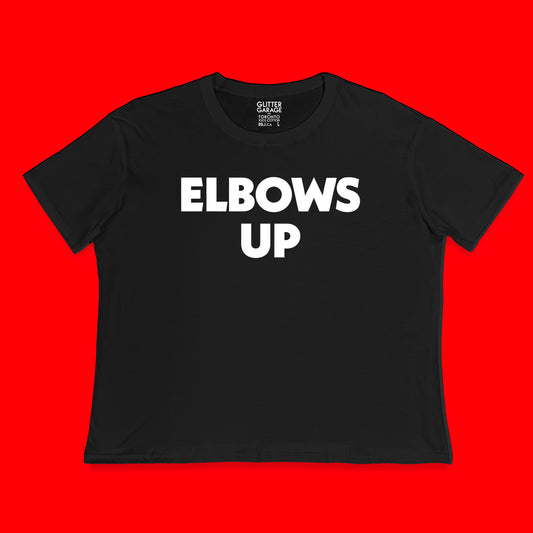 "Elbows Up" large text in white on black Canadian-made boxy tee