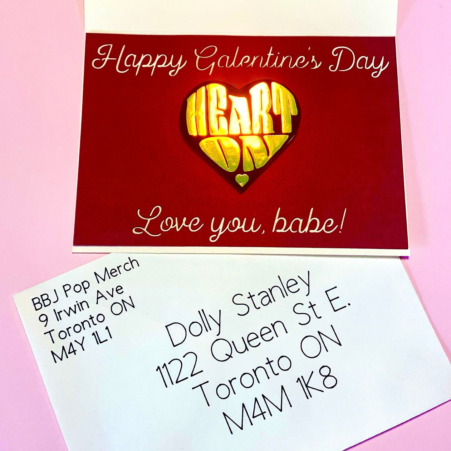 "Heart On" heart-shaped pin - holo gold & black option, packaged with personal message "Happy Galentine's Day, Love you, babe!" cut in deep red & cream card, envelope set