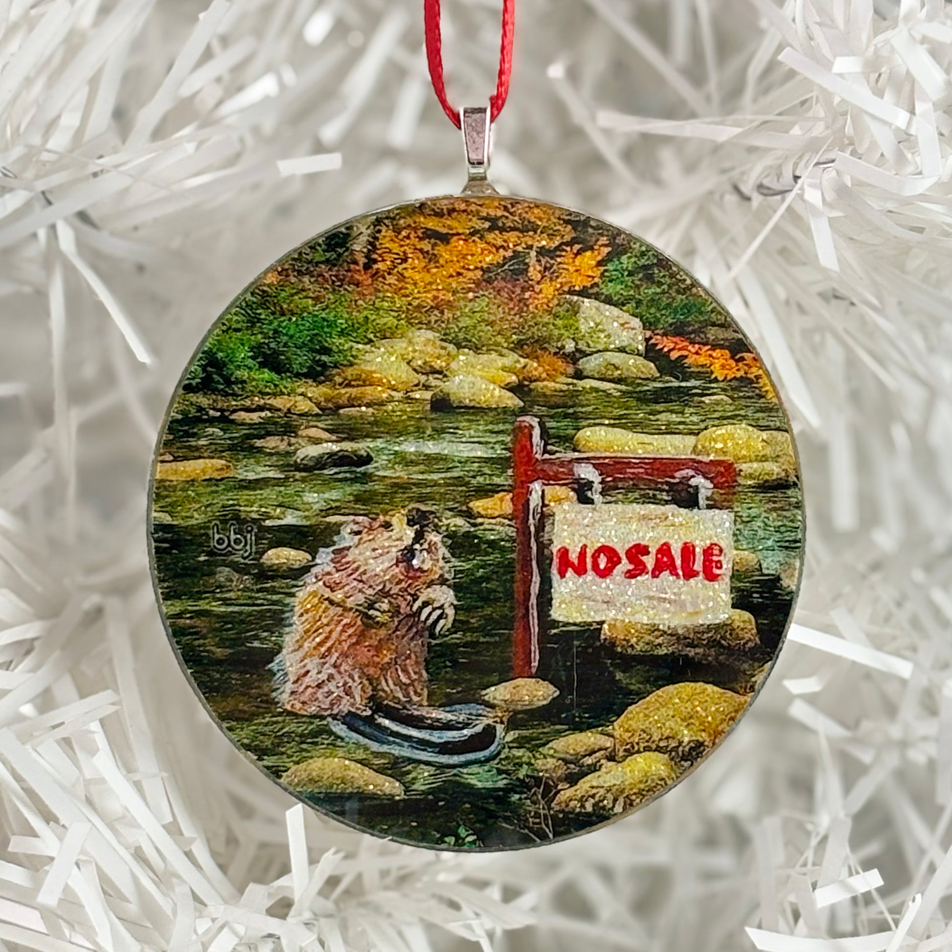 Round handmade glass Christmas ornament with image of No Sale Beaver original painting