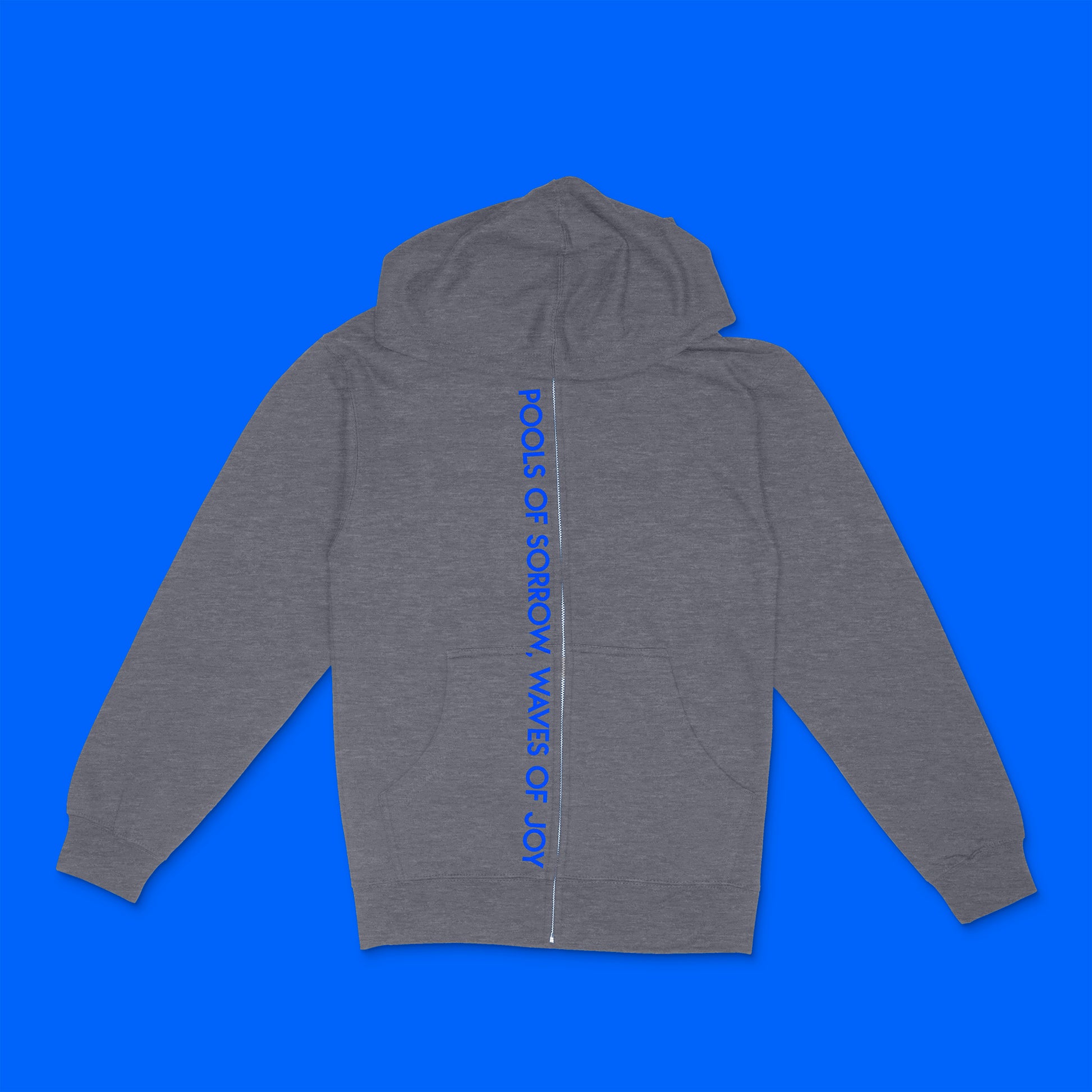 gunmetal heather unisex zip hoodie with custom sample text "Pools of Sorrow, Waves of Joy" in neon blue, geometric text style along zipper of garment  Edit alt text