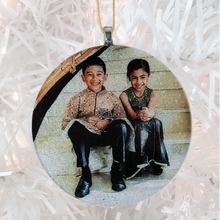 Load image into Gallery viewer, 2 cute kids - white glitter - Custom image glass and glitter handmade holiday ornament. 
