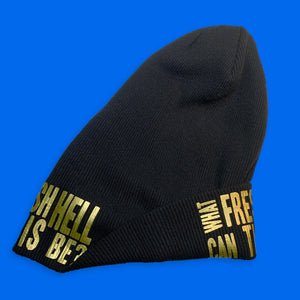black toque beanie hat, side view/half-cuffed, text graphic "What Fresh Hell Can This Be?" in gold