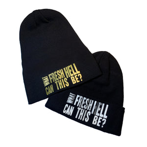 2 black toque beanie hats, text graphic "What Fresh Hell Can This Be?" in gold, silver