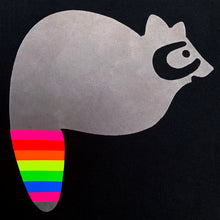 Load image into Gallery viewer, texture detail of fuzzy grey flock raccoon with neon rainbow striped tail on black unisex shorts by BBJ / Glitter Garage
